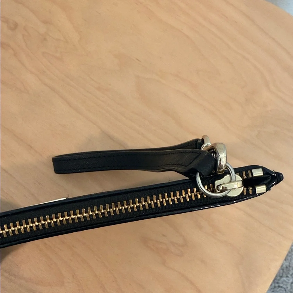 kate spade black leather wristlet with gold hardware